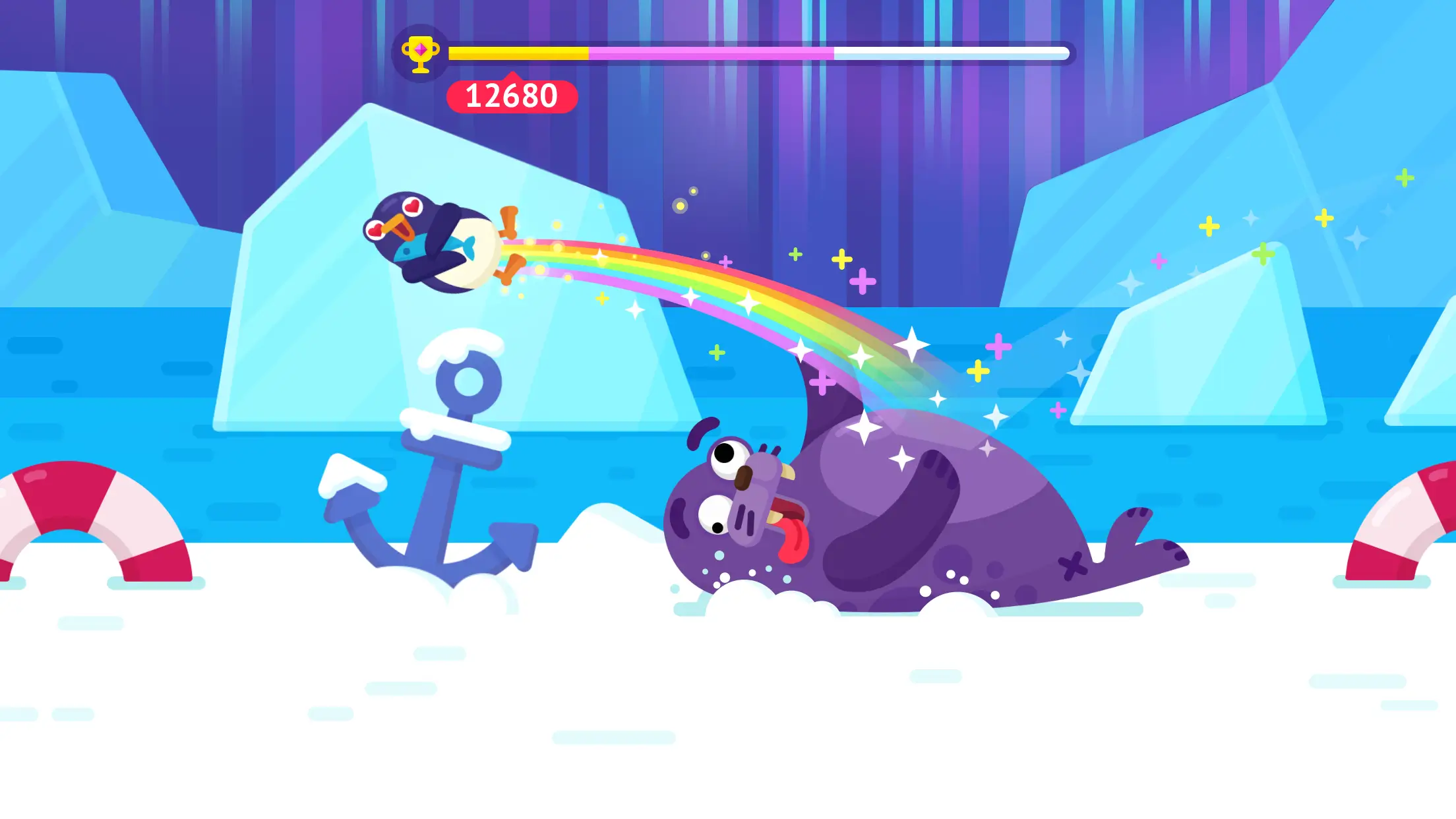 A penguin soaring through the air with a rainbow trail after hitting a seal in Bouncemasters. The icy landscape features colorful icebergs and an anchor, with sparkling effects.